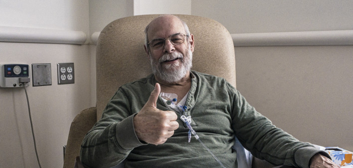 old man with beard giving thumbs up chemo therapy treatment