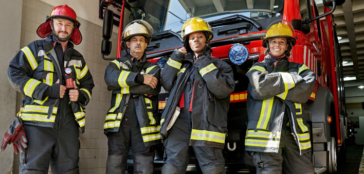Outdoor Portrait of Diverse Firefighters at Engine House