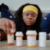 Serenity Cole takes several medications after undergoing gene therapy for sickle cell disease.