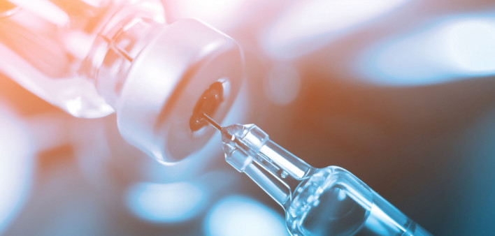 syringe in vial vaccine