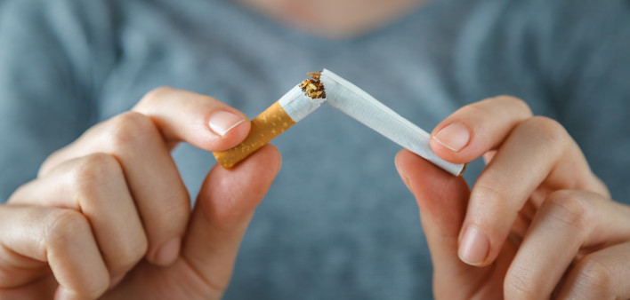 hands break cigarette quite smoking