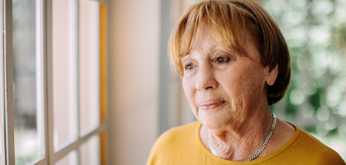 Senior woman in nursing home sad unhappy