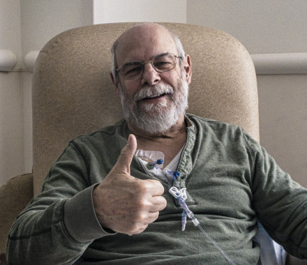 old man with beard giving thumbs up chemo therapy treatment