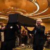 Pallbearers proceed with symbolic coffins at the Save HIV Funding Campaign's Funeral Protest and Celebration of Life on March 16, 2026, in Washington, DC.