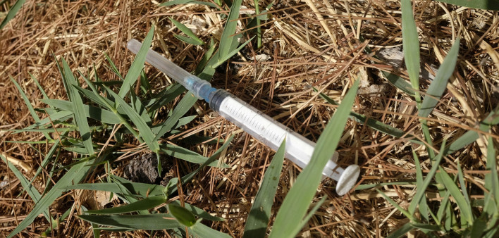 Abandoned syringe on the street