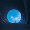 figure at the end of a tunnel