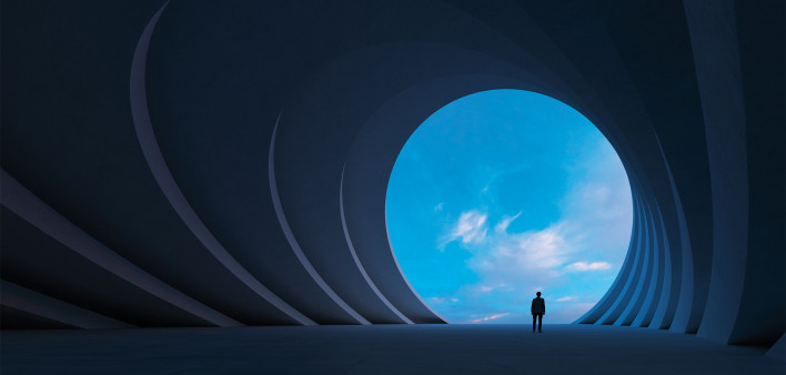 figure at the end of a tunnel