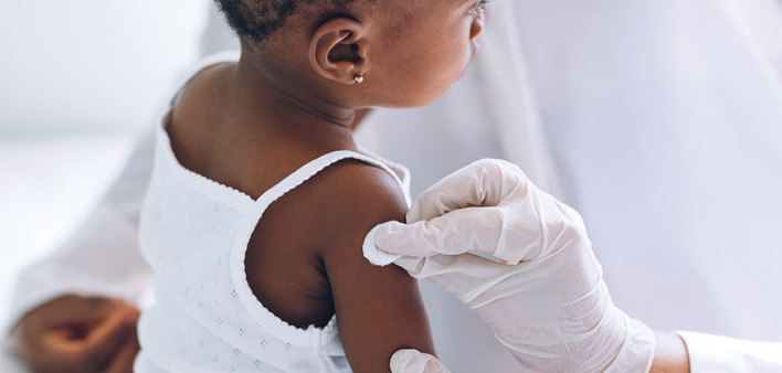young child getting a vaccine