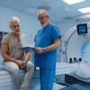 A doctor explains CT scan results.
