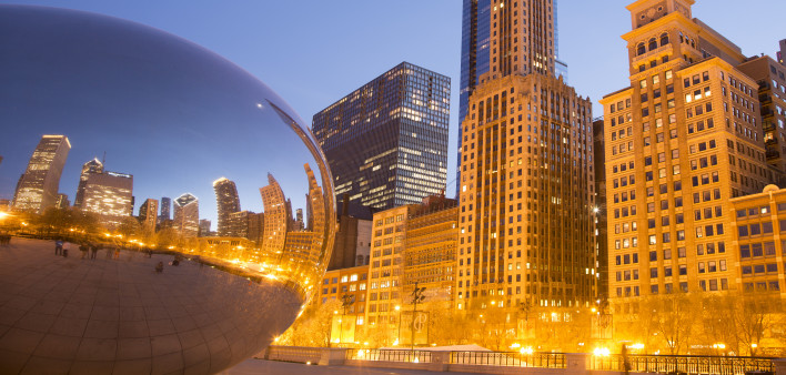 City skyline and reflection in mirror at sunset, Chicago, IL