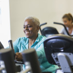 older woman on exercise bike