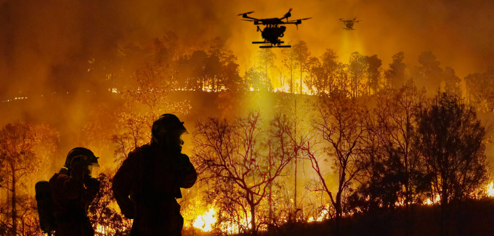 Firefighting drones spray chemical to help control wildfires