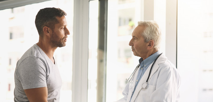 Cropped shot of a senior doctor giving his male patient a thorough checkup during his consultation