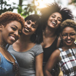 Black women Teenager Girls smiling having fun outdoors
