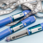 Ozempic Insulin injection pen or insulin cartridge pen for diabetics. Medical equipment for diabetes parients. stock photo Injecting, Semaglutide, Medical Injection, Syringe, Abdomen