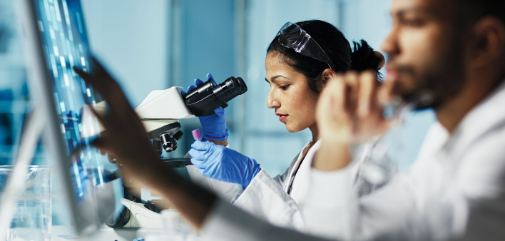 researchers working in the lab