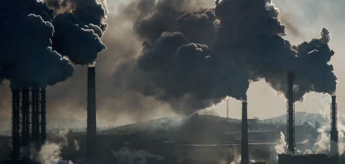 Ecological catastrophy smokestacks billowing smoke