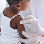 young child getting a vaccine