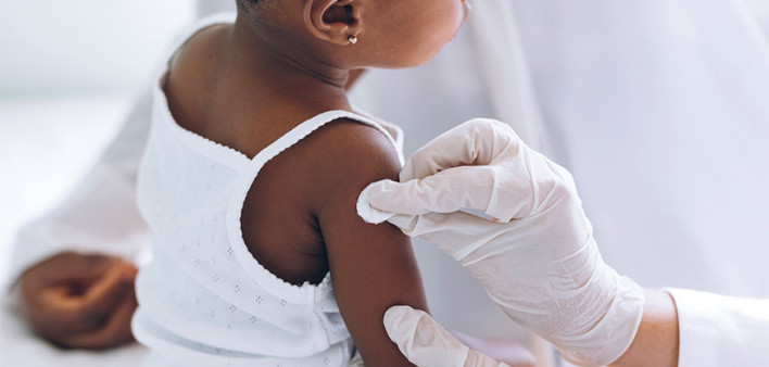 young child getting a vaccine