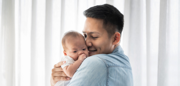 man and baby father holding baby