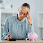 Debt, broke and financial crisis for a business woman frustrated and stressed without money.