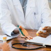 Female doctor discusses medication with patient