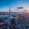 Toronto skyline with CN Tower at sunset.