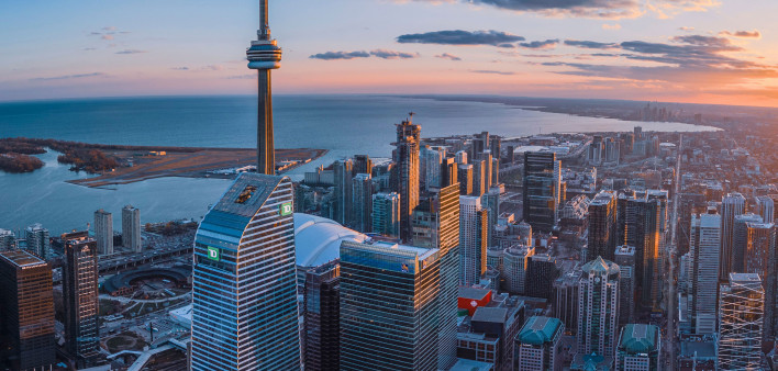 Toronto skyline with CN Tower at sunset.