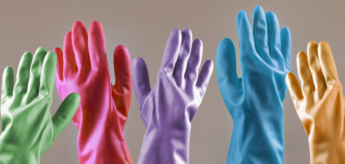 Migrant votes. Doctors voting. Healthcare system in elections. Hands of housewife in protective rubber gloves