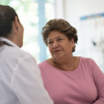 Older Woman talking with the Doctor