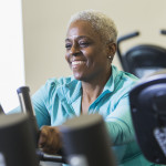 older woman on exercise bike