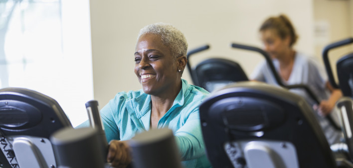 older woman on exercise bike