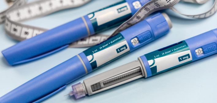 Ozempic Insulin injection pen or insulin cartridge pen for diabetics. Medical equipment for diabetes parients. stock photo Injecting, Semaglutide, Medical Injection, Syringe, Abdomen