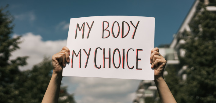 Woman holding a sign My Body, My Choice