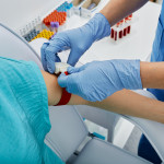 Nurse taking blood for patient analysis in medical laboratory stock photo Blood Test, Medical Test, Women, Tourniquet, Blood