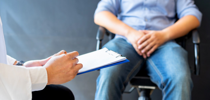 Male doctor and prostate cancer patient are discussing about prostate cancer test report. Diagnostic, prevention of men diseases,