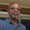 Earl Williams, former community development director with the Thomasville Community Development Corp., stands in front of a building the Georgia city hoped would be turned into a healthcare clinic in the Dewey City neighborhood.