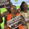 Activists disrupt U.S. State Department official Jeff Graham at AIDS 2026