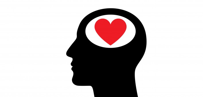 illustration ofheart in the head of mans silhouette