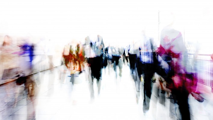 blurred abstrat image of people on city street