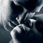 a man and woman about to kiss
