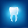 a tooth against a blue background