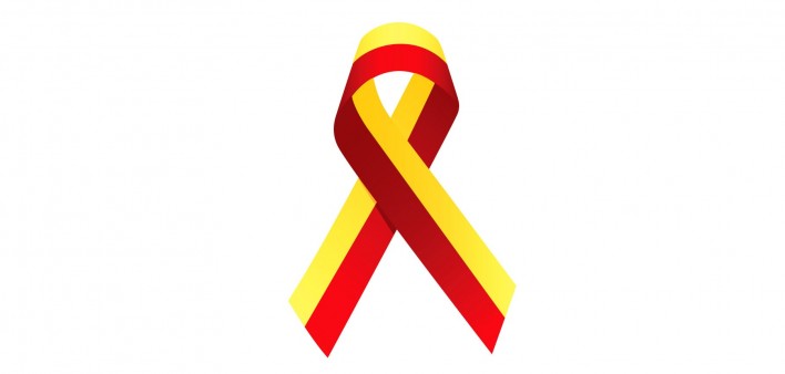 a yellow and red ribbon for HCV awareness hep c