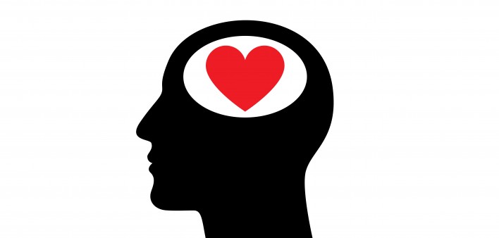 illustration ofheart in the head of mans silhouette