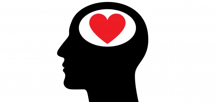 illustration ofheart in the head of mans silhouette