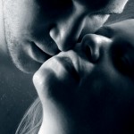 a man and woman about to kiss