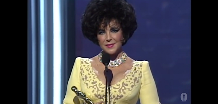 Elizabeth Taylor receives the Jean Hersholt Humanitarian Award at the 1993 Academy Awards