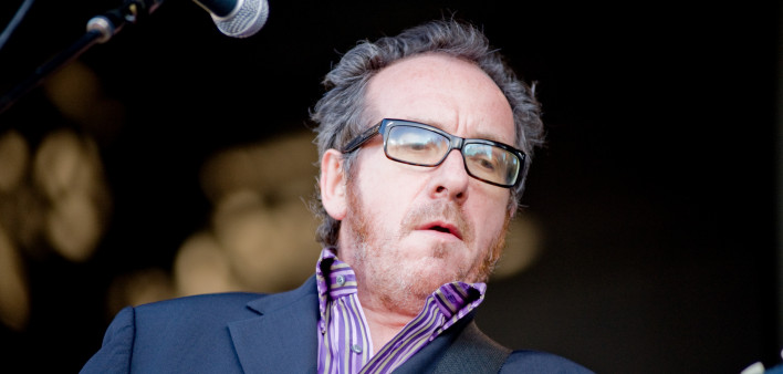 Singer Elvis Costello performs onstage at the Sleep Train Amphitheater in Marysville, CA with his band the Imposters