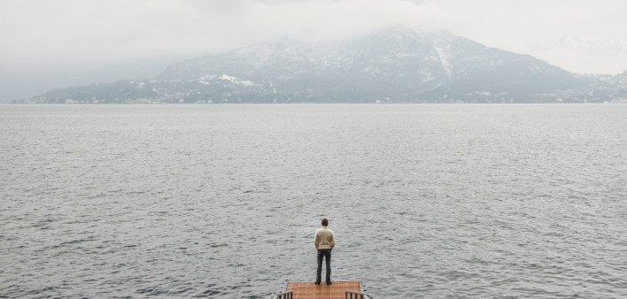 solitary man on pier
