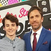 Connor McMahon (center), a 17-year-old three-time survivor of acute lymphblastic leukemia, on the “Good Morning America” set with co-host Michael Strahan (left) and New York Rangers goalie Henrik Lundqvist (right), McMahon’s favorite hockey player